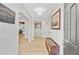 Bright and airy entryway with wood flooring, a bench, and arched doorways leading to other rooms at 108 E Walker Dr, Summerville, SC 29483