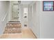 Hallway with brick steps, built-in display niche, and closet, adding character and functionality at 108 E Walker Dr, Summerville, SC 29483