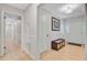 Bright hallway featuring hardwood floors, neutral colored walls, and a decorative painting at 108 E Walker Dr, Summerville, SC 29483