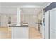 Kitchen with white cabinets, granite countertops, and hardwood floors at 108 E Walker Dr, Summerville, SC 29483