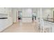 Kitchen featuring white cabinets, hardwood floors, and granite countertops at 108 E Walker Dr, Summerville, SC 29483