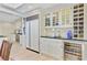 Kitchen featuring white cabinets, a wine fridge, and stainless steel appliances at 108 E Walker Dr, Summerville, SC 29483