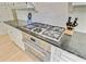 Kitchen with stainless steel oven, granite countertops, and tile backsplash at 108 E Walker Dr, Summerville, SC 29483