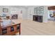 Open living area with wood floors, stylish furnishings, and a glimpse of the dining area at 108 E Walker Dr, Summerville, SC 29483
