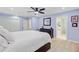 Spacious main bedroom with hardwood floors, ceiling fan, and an ensuite bathroom at 108 E Walker Dr, Summerville, SC 29483