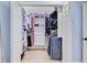 Walk-in closet with custom shelving and storage at 108 E Walker Dr, Summerville, SC 29483