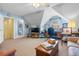 Large bonus room with office, lounge areas, and a view into the connecting bathroom at 1111 Ole South Ct, Moncks Corner, SC 29461
