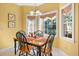 Inviting eat-in kitchen area, featuring natural light with a cozy dining table that seats four at 1111 Ole South Ct, Moncks Corner, SC 29461