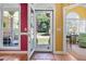 Open foyer with hardwood floors, decorative walls, and an inviting view of the front yard at 1111 Ole South Ct, Moncks Corner, SC 29461