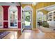 Inviting foyer with hardwood floors, decorative walls, and a view of the outdoors at 1111 Ole South Ct, Moncks Corner, SC 29461