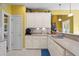 Well-lit kitchen with upper cabinets, stainless steel sink, and modern appliances at 1111 Ole South Ct, Moncks Corner, SC 29461
