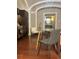 Modern apartment featuring kitchen, dining area, chair, and view into another room at 12 Bee St # C, Charleston, SC 29403