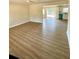 Spacious living room with light-colored laminate flooring and ample natural light at 121 Camelot Dr, Goose Creek, SC 29445