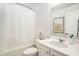 Clean and bright bathroom featuring a white vanity, classic fixtures, and a framed mirror at 121 Cherry Grove, Summerville, SC 29483