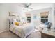 Comfortable bedroom with a relaxed vibe, featuring a mix of patterns, soft lighting, and natural wood tones at 121 Cherry Grove, Summerville, SC 29483