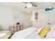 Inviting bedroom featuring bright and colorful decor, paired with a cool-toned ceiling fan and natural accents at 121 Cherry Grove, Summerville, SC 29483