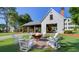 Outdoor fire pit area with Adirondack chairs offers a cozy spot for relaxation and socializing near the community center at 121 Cherry Grove, Summerville, SC 29483