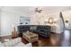 Comfortable living room with a large sectional sofa, stylish decor, and hardwood floors at 121 Cherry Grove, Summerville, SC 29483