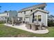 Spacious patio with pergola, outdoor seating, and dining area, ideal for relaxation and entertaining at 121 Cherry Grove, Summerville, SC 29483
