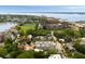 Beautiful aerial of a town featuring a lake, tennis courts, and the surrounding cityscape at 122 Beaufain St # C, Charleston, SC 29401