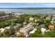 Scenic aerial view showcasing a waterfront community with a marina, lush greenery, and beautiful waterways at 122 Beaufain St # C, Charleston, SC 29401