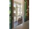 Charming balcony with seating and view of a neighboring building at 122 Beaufain St # C, Charleston, SC 29401