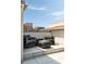 Outdoor seating area featuring cushioned chairs and a table, perfect for relaxing at 122 Beaufain St # C, Charleston, SC 29401
