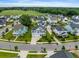 Aerial view of a beautiful neighborhood with well-maintained lawns and landscaping at 1234 Captain Rivers Dr, Charleston, SC 29412