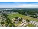 A scenic aerial view reveals a community with green spaces and recreational fields at 1234 Captain Rivers Dr, Charleston, SC 29412