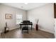 Music room features a grand piano, a guitar, and lots of space at 1234 Captain Rivers Dr, Charleston, SC 29412