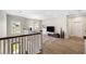 Bright living room area boasts wood floors, a modern chandelier, and plenty of natural light at 1234 Captain Rivers Dr, Charleston, SC 29412