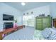 Comfortable bedroom with a full bed and a view to the city at 1242 Allusion Ln # 206, Mount Pleasant, SC 29466