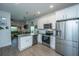 Well-equipped kitchen featuring modern appliances, granite countertops, and stylish cabinetry at 1242 Allusion Ln # 206, Mount Pleasant, SC 29466