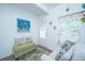 Comfortable living area featuring a love seat and window, decorated with art at 1242 Allusion Ln # 206, Mount Pleasant, SC 29466
