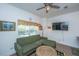 Comfortable living room with sofa, TV, and bright window, creating an inviting space at 1242 Allusion Ln # 206, Mount Pleasant, SC 29466