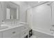 Bright bathroom with white subway tiles, a combined tub and shower, and modern fixtures at 1308 Cadet Ct, Mount Pleasant, SC 29466