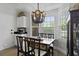 Cozy breakfast nook featuring a stylish chandelier and bright bay window with natural light and views at 1308 Cadet Ct, Mount Pleasant, SC 29466
