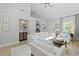 Inviting living room with vaulted ceiling and sight lines to a display cabinet at 1308 Cadet Ct, Mount Pleasant, SC 29466
