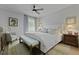 Serene bedroom with a ceiling fan, a plush bed, and soft blue accents at 1308 Cadet Ct, Mount Pleasant, SC 29466