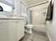 Bright bathroom with a shower-tub combination and a white vanity at 1329 Camp Rd, Charleston, SC 29412