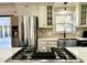Modern kitchen featuring stainless steel appliances, a gas range, and farmhouse sink at 1329 Camp Rd, Charleston, SC 29412