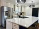 Bright, modern kitchen with stainless steel appliances and a large island at 1329 Camp Rd, Charleston, SC 29412