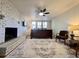 Bedroom features a brick fireplace and large rug at 1329 Camp Rd, Charleston, SC 29412