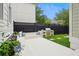 Outdoor patio features a built-in seating area with cushions and an outdoor kitchen with stainless steel grill at 1474 Blue Cascade Dr, Mount Pleasant, SC 29464