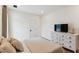 Comfortable bedroom with soft bedding, a white dresser, and a television for relaxation at 1474 Blue Cascade Dr, Mount Pleasant, SC 29464