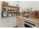 Prep kitchen showcases open shelving, white cabinets, and stainless appliances at 1474 Blue Cascade Dr, Mount Pleasant, SC 29464