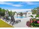 Relaxing pool area featuring lounge chairs and well-kept grounds for community enjoyment at 1474 Blue Cascade Dr, Mount Pleasant, SC 29464