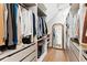 Spacious walk-in closet with custom shelving and drawers, offering ample storage and organization solutions at 1474 Blue Cascade Dr, Mount Pleasant, SC 29464