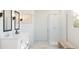 Elegant bathroom with a dual sink vanity, frameless glass shower, and modern fixtures at 2046 Mcguire Ln # 012, Hollywood, SC 29449