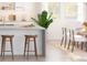Bright kitchen featuring a vast island and breakfast bar, with sleek countertops and minimalist decor at 2046 Mcguire Ln # 012, Hollywood, SC 29449